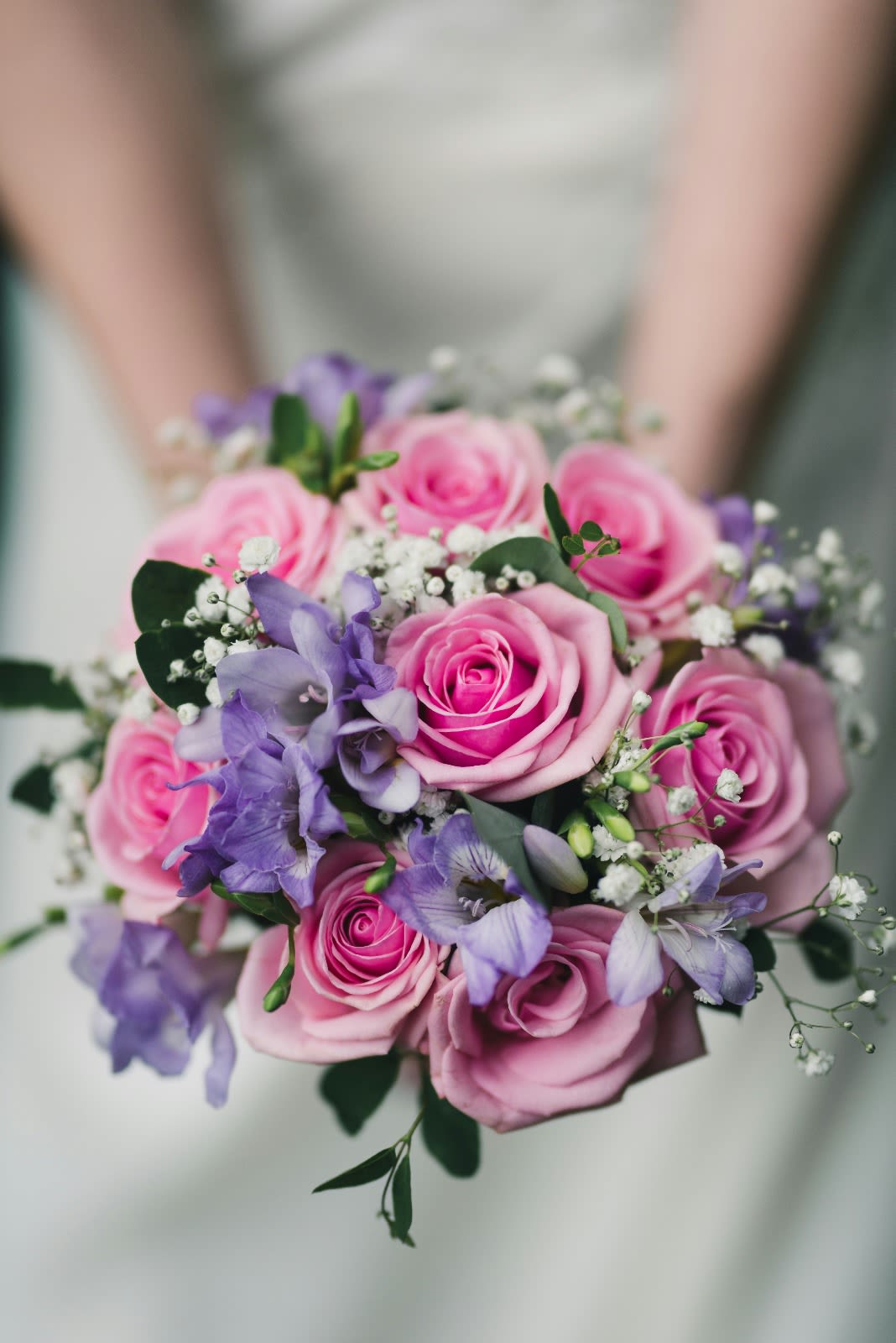 Pink and lavender rose bouquet with baby's breath
