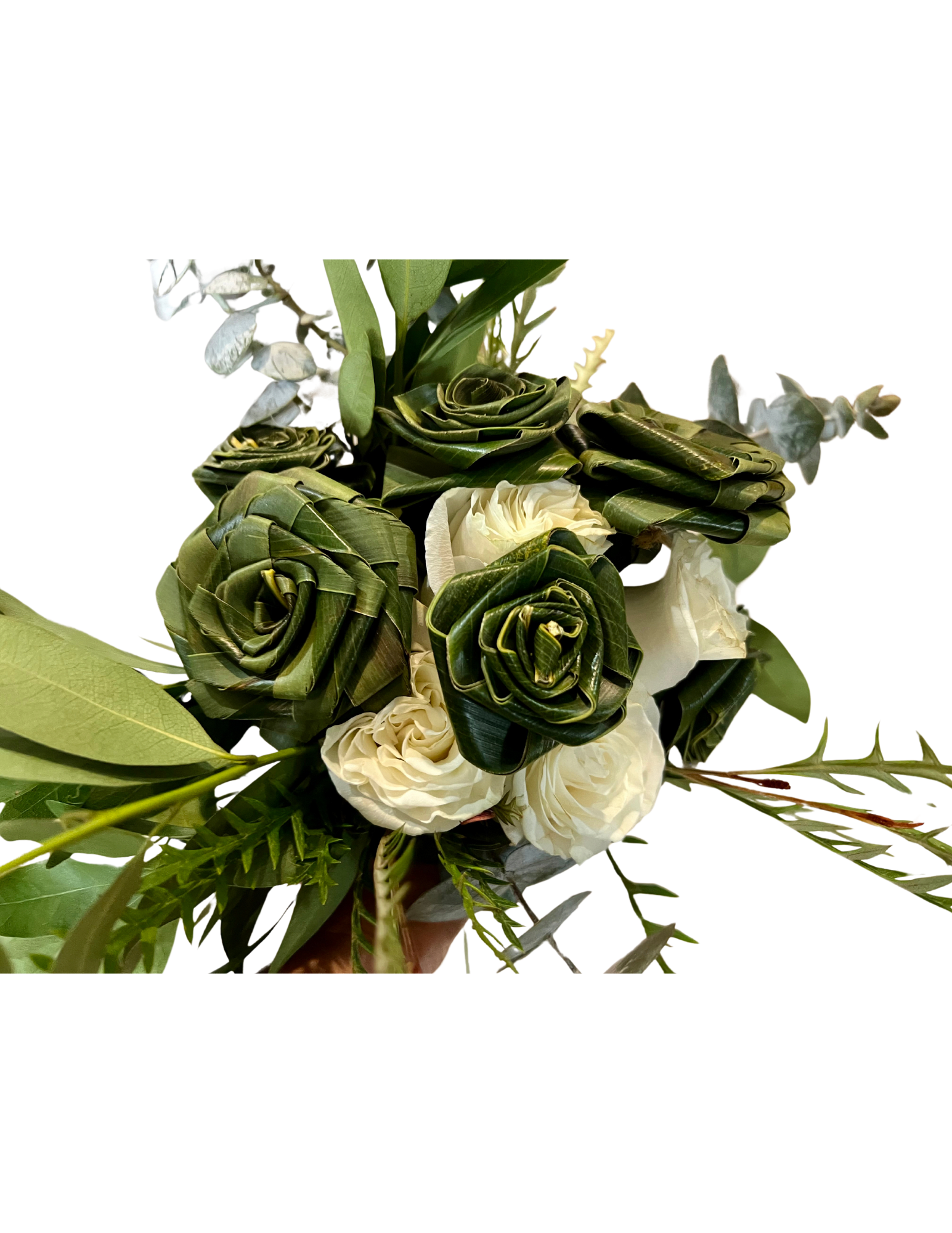 Niu Pua Bouquet - Coonut Leaf Roses  - A Blend of Tradition and Beauty&nbsp;  This bouquet contains 6 coconut leaf roses and 6 red or white roses and greens.  The Niu Pua bouquet is a unique blend of handcrafted coconut leaf roses (pua niu) and fresh roses. Inspired by Hawaiian culture, this bouquet represents both the strength of the niu (coconut) and the delicate beauty of roses. Perfect for any occasion, it brings together tradition and nature in one stunning arrangement.