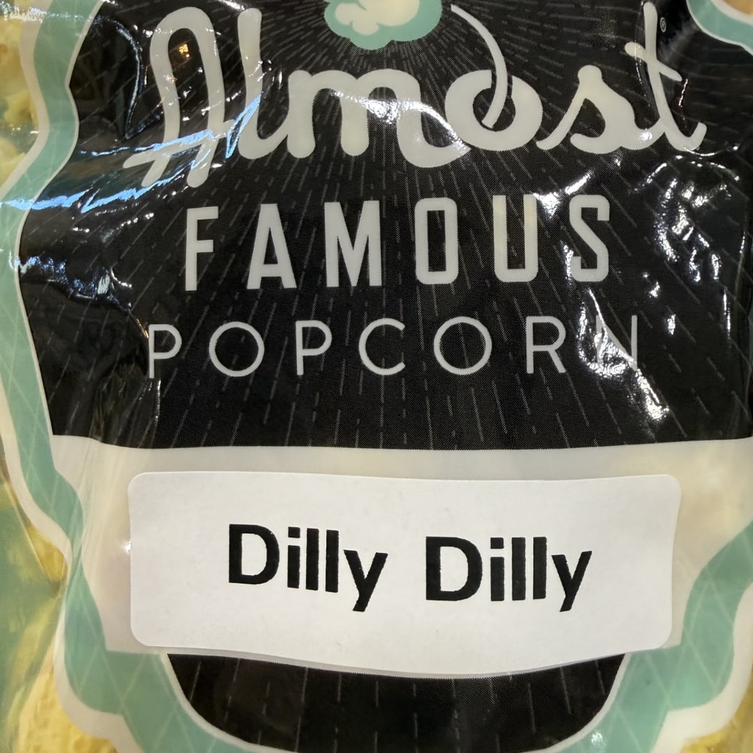 Bag of Dillly Dilly Famous Popcorn with a white label