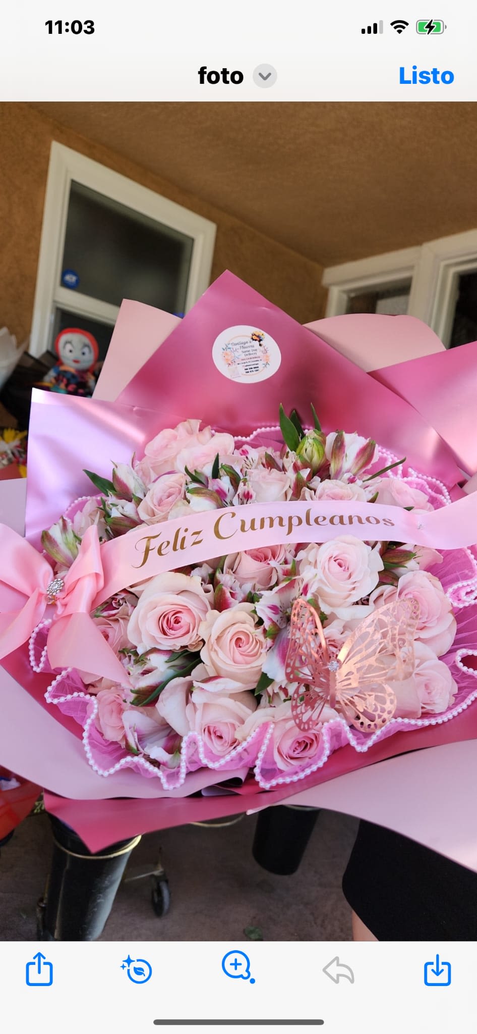 Pink rose bouquet with a birthday ribbon and butterfly decoration
