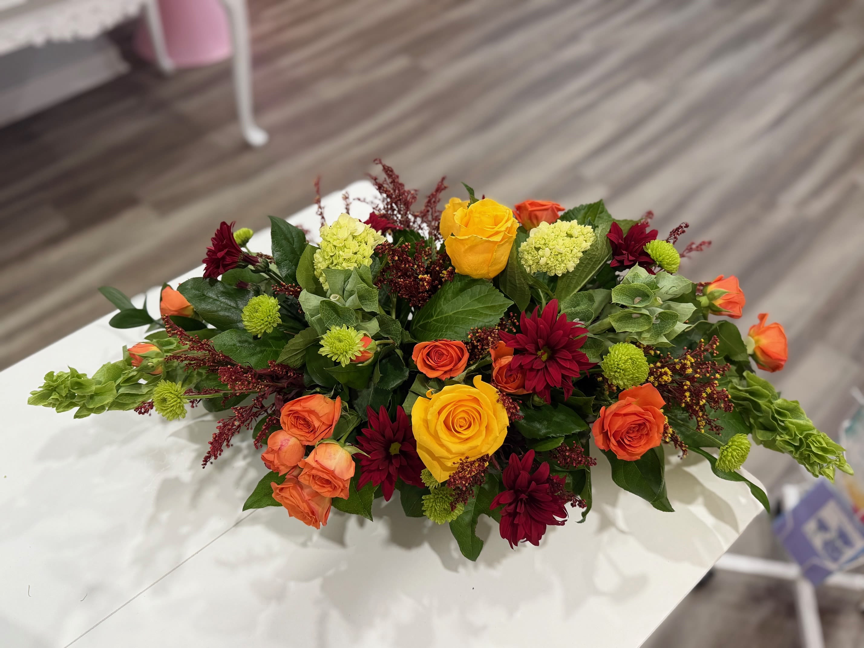 Thanksgiving #3  - Premium fresh flowers in this centerpiece.