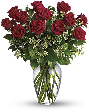 Bouquet of red roses in a clear glass vase
