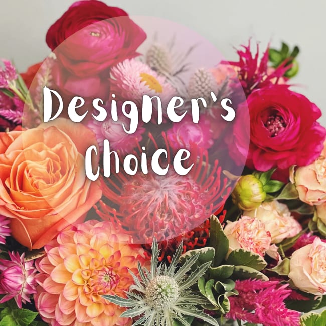 Mixed bouquet of roses, ranunculus, and dahlias with designer's choice text