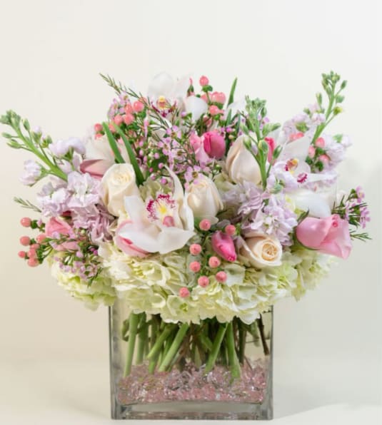 Princess collection - One of the best combination's of the best flowers tulips, roses, orchids, hydrangea and coffee beans in a square glass container 