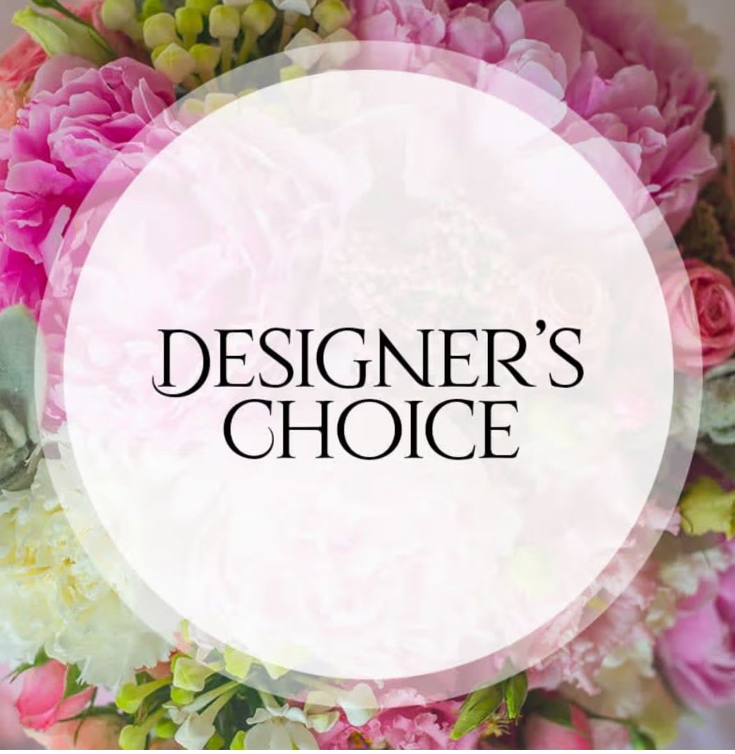 Pink and white floral arrangement with a Designer's Choice label