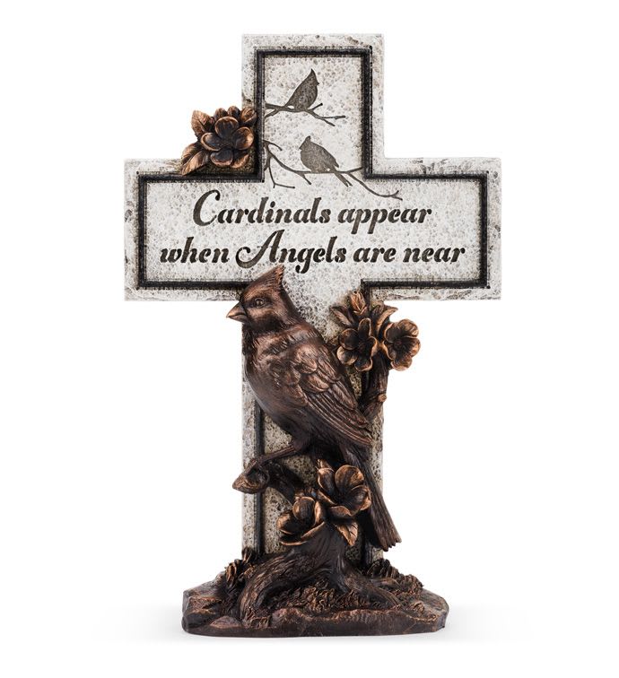 Stone-look cross with bronze cardinal and flowers and the phrase 'Cardinals appear when Angels are near'.
