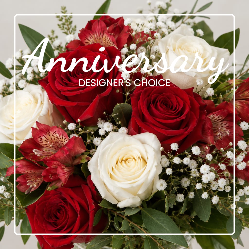 Bouquet of red and white roses with small white filler flowers