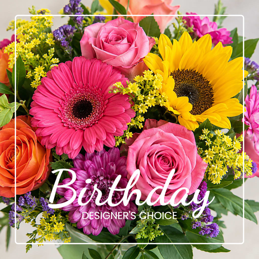 Bright mixed bouquet with pink roses, gerbera daisies, and a sunflower