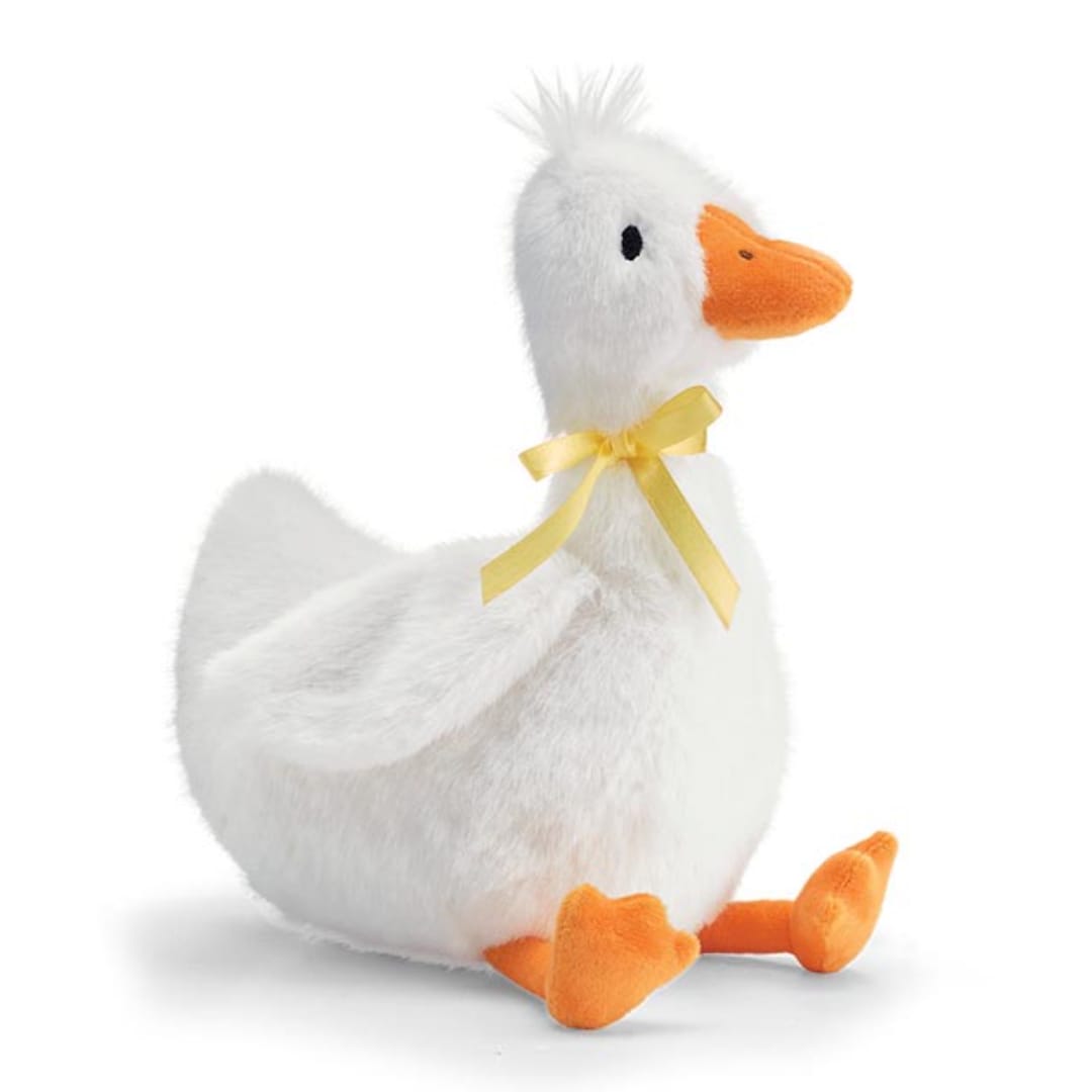 White plush duck with an orange beak and feet, tied with a yellow ribbon