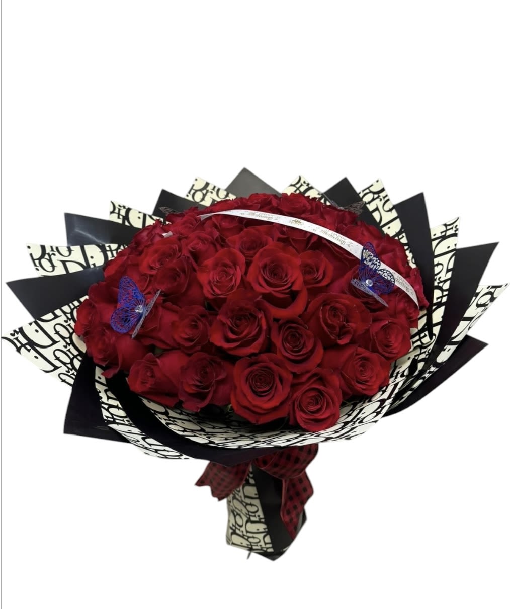 Elegance bouquet  - The elegant bouquet  with 75 roses perfect for any occasion. We decorate it with diamonds, butterflies and a bow that give it a special touch. This is a buchon bouquet so it does not include a base.
