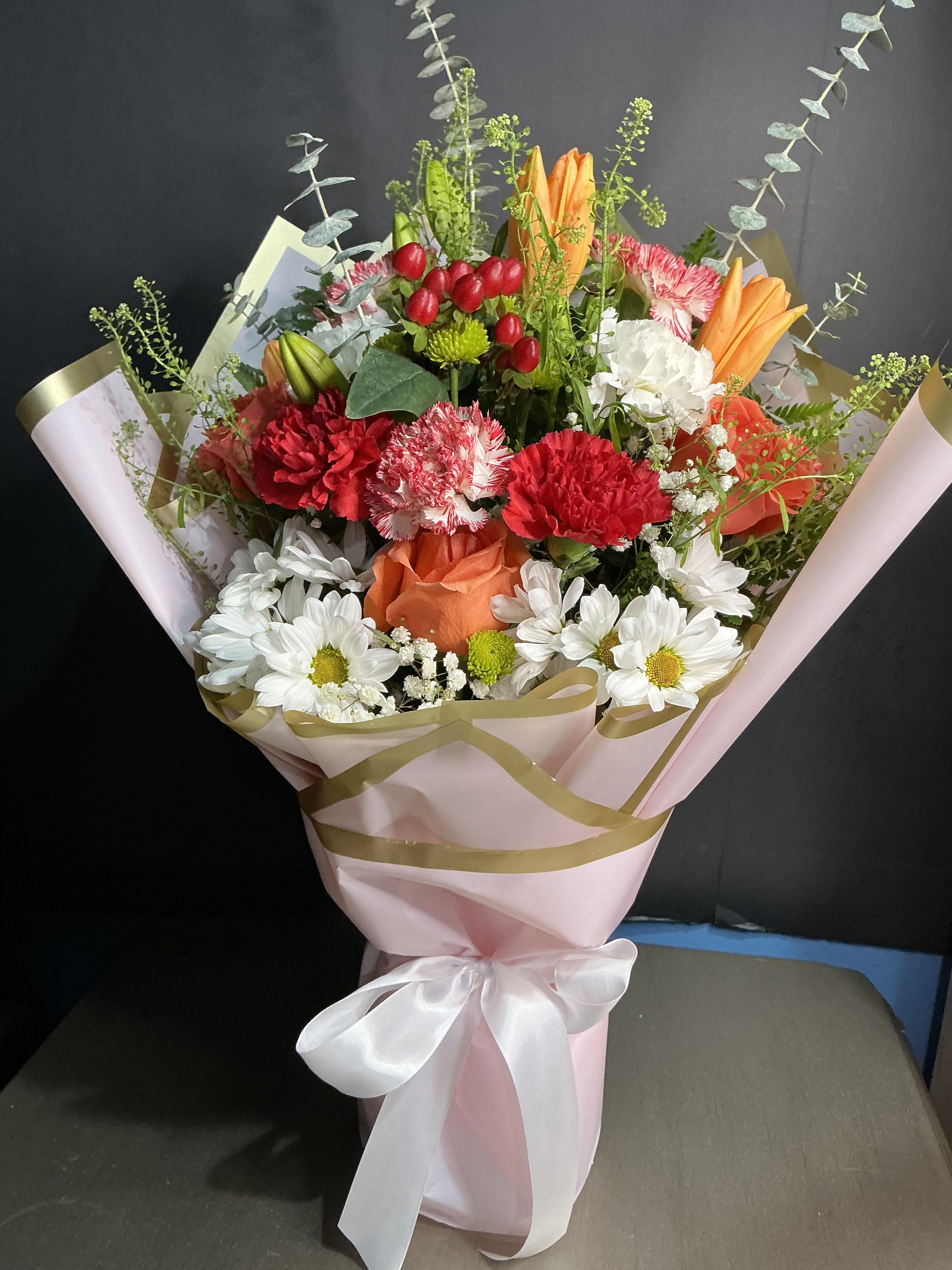 Orange Lily  - These arrangement it’s ready for any special occasion   Lilies, carnations, chisanthemums and greens dipesigned on special korean paper 