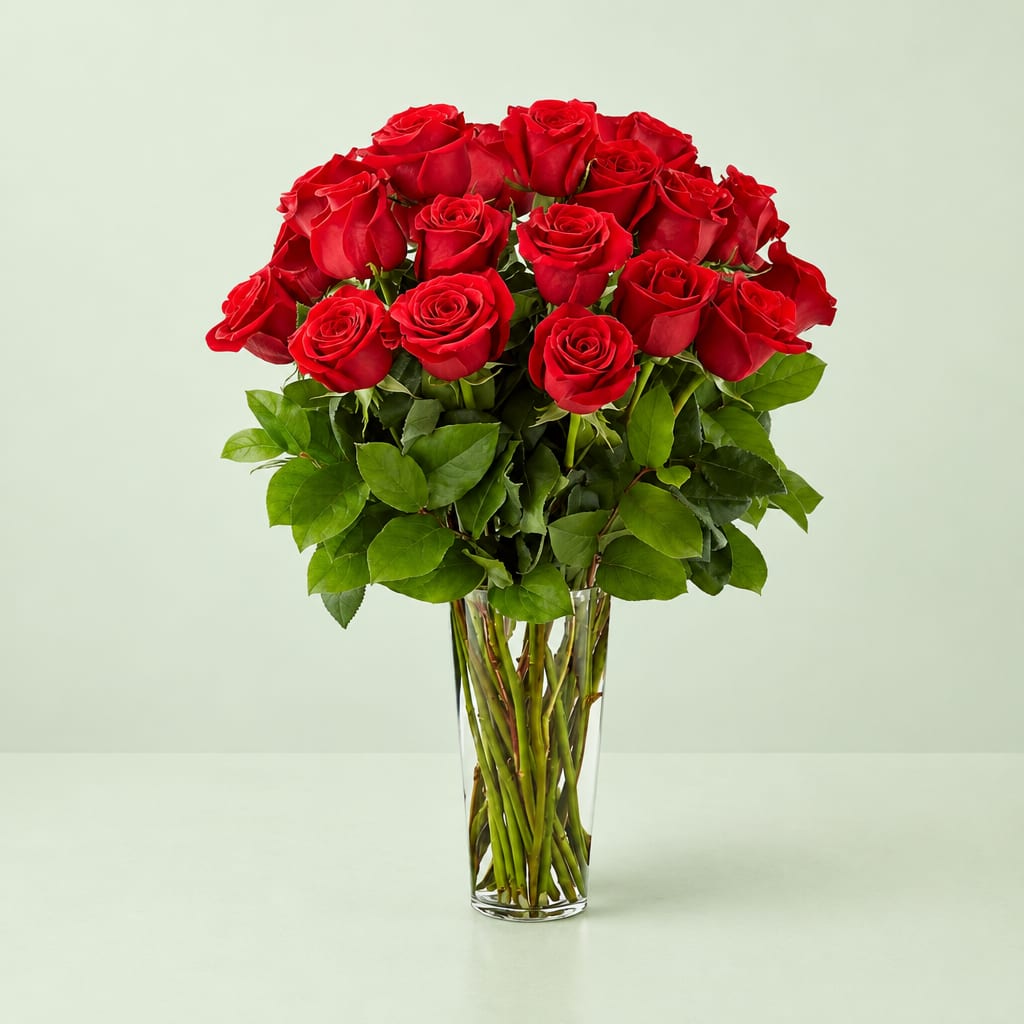 Bouquet of red roses in a clear glass vase