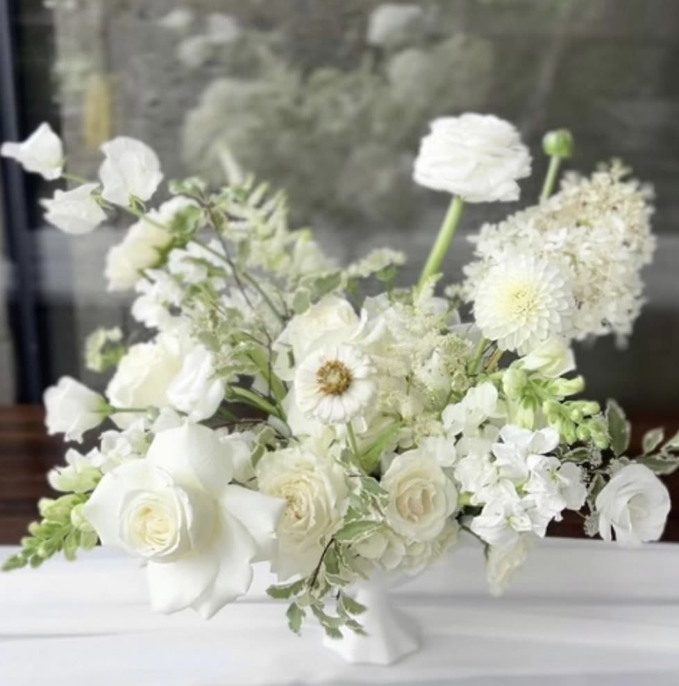 Timeless Elegance  - As a floral designer, I take immense pleasure in crafting unique and elegant bouquets that transform any space into something extraordinary. My passion lies in revolutionizing the world of floristry by creating one-of-a-kind floral arrangements that stand out and captivate. For me, designing is not just a profession but a way to infuse beauty and sophistication into every environment, enhancing your brand’s image with distinctive floral artistry.    