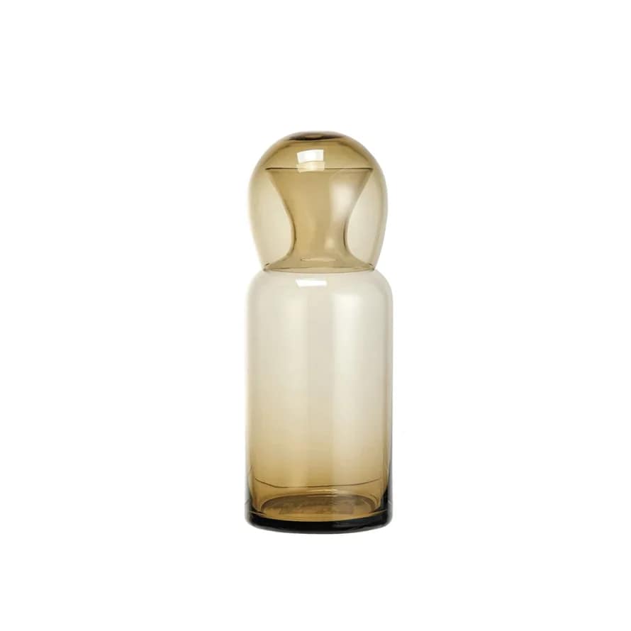 Amber glass bottle-shaped vase on a white background