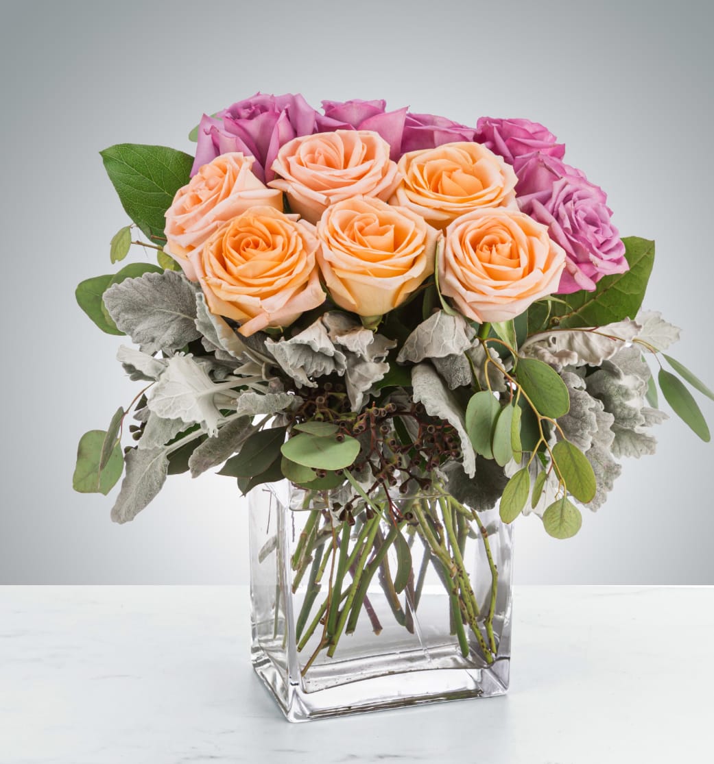 Gemini  - This luxury arrangement is a lovely and soft rose arrangement that will surely make the recipient gasp. Perfect for Valentine's Day, Anniversaries, or saying "I love you".  Approximate Dimensions: 15"D x 18"H