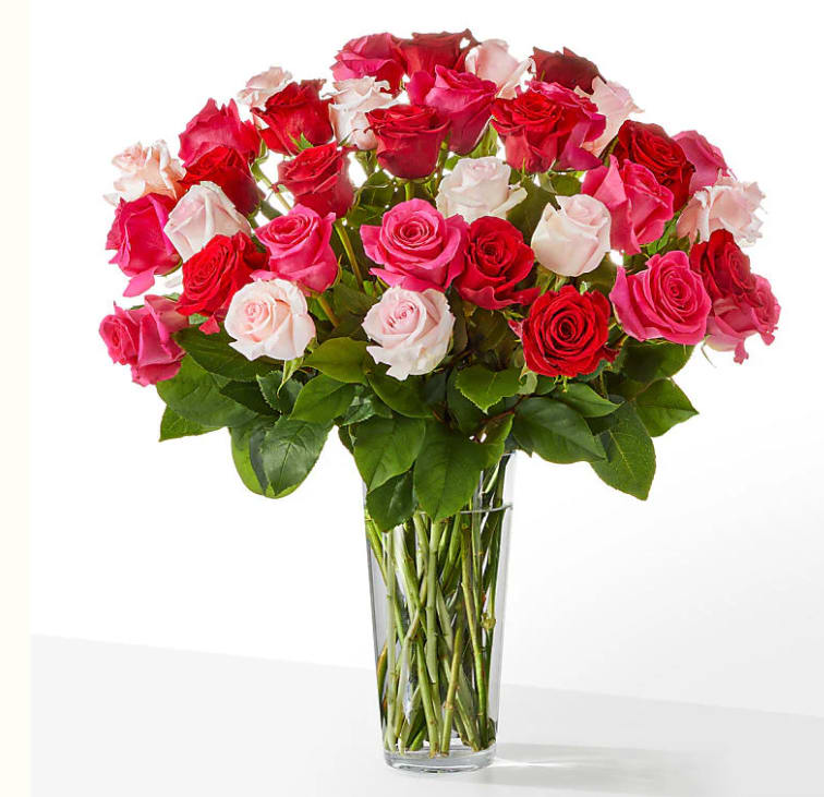 Three Dozen Charming Bouquet - Three dozen of gorgeous blend of pink, hot pink and red roses.