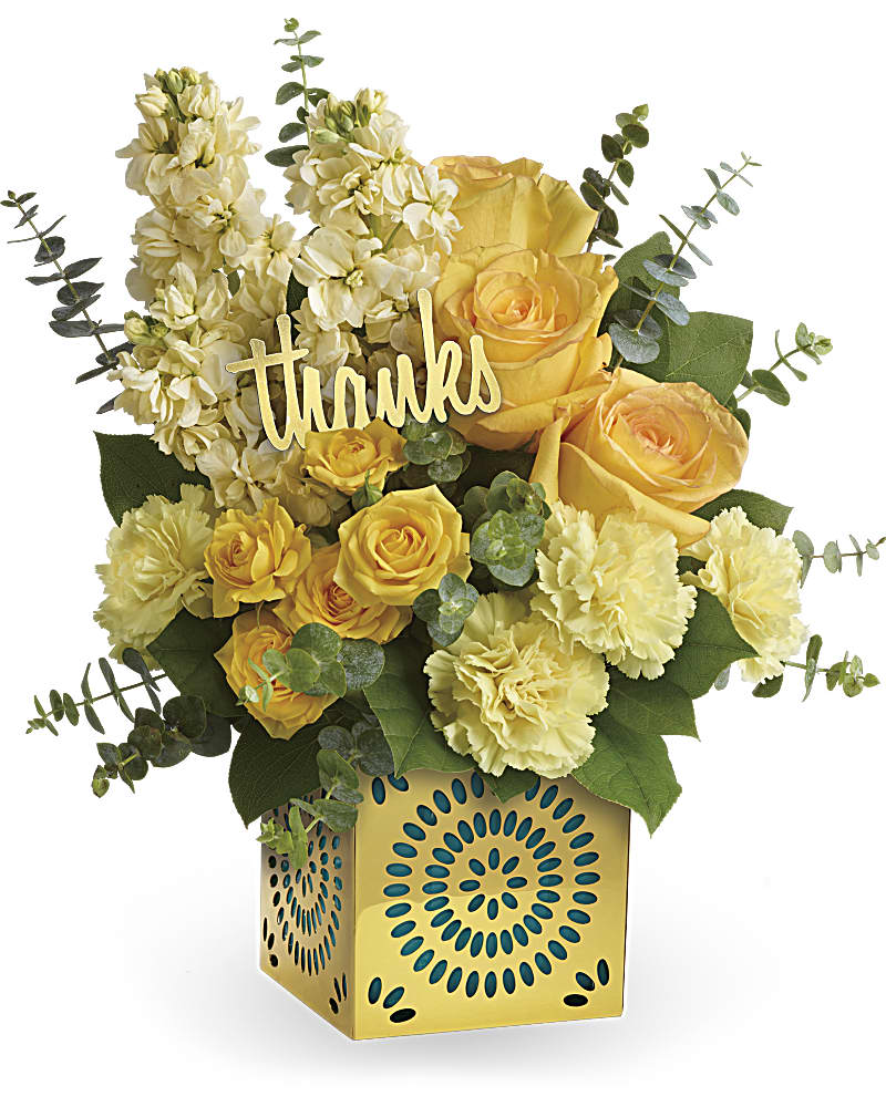 Shimmer Of Thanks Bouquet - Show your appreciation in a most stylish way with this sunny bouquet of yellow roses, stock and carnations! The happy bouquet is hand-delivered in a shimmering golden cube with delicate cutouts. Remove the teal liner and "thanks" and the cube becomes a contemporary candleholder.