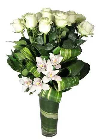 White roses and orchids in a wrapped green bouquet