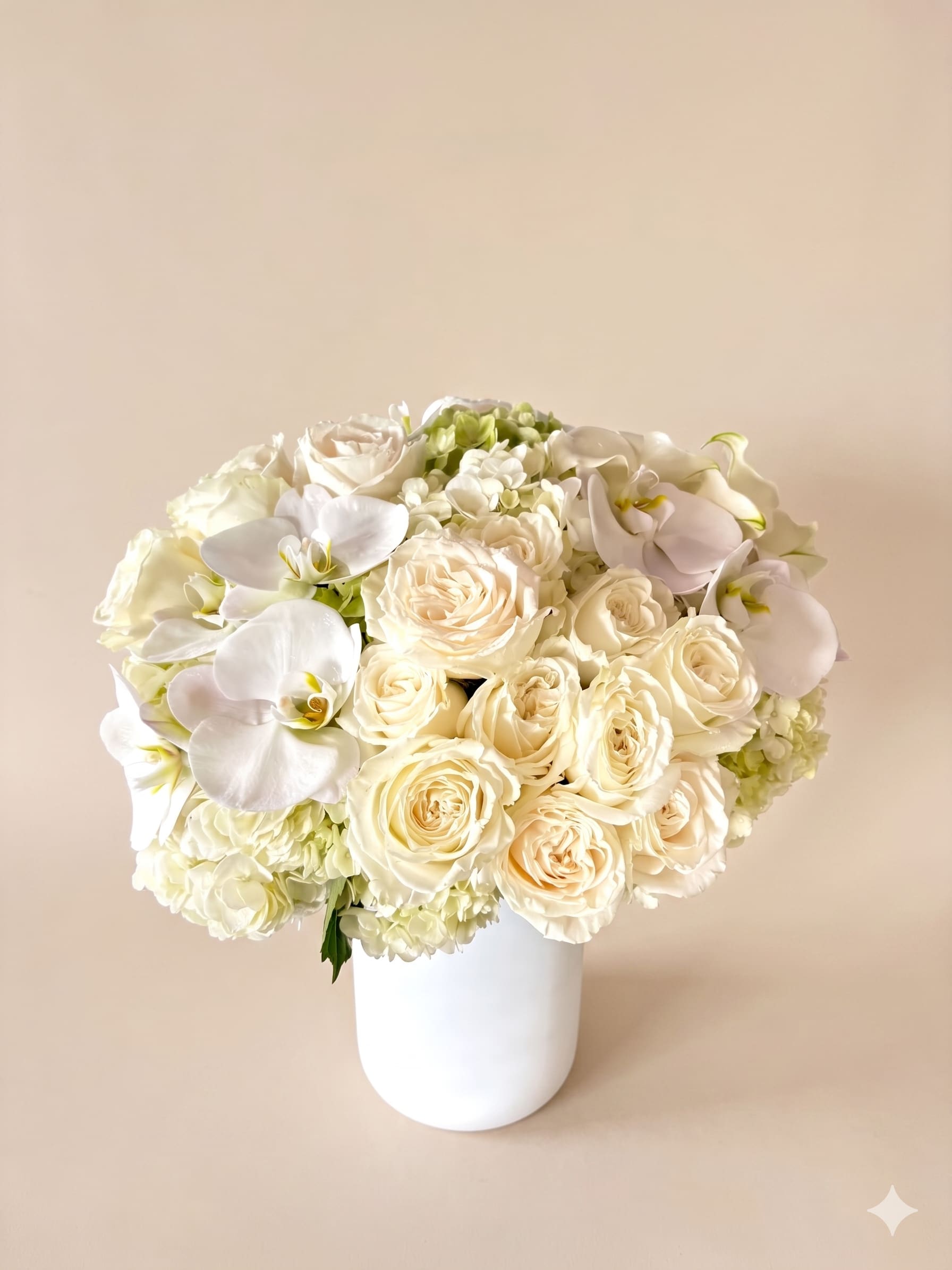 BP61 - Precious Ivory - Grand Arrangment prefect for sending your warm thoughts to loved ones, featuring white roses and beautiful orchids. 