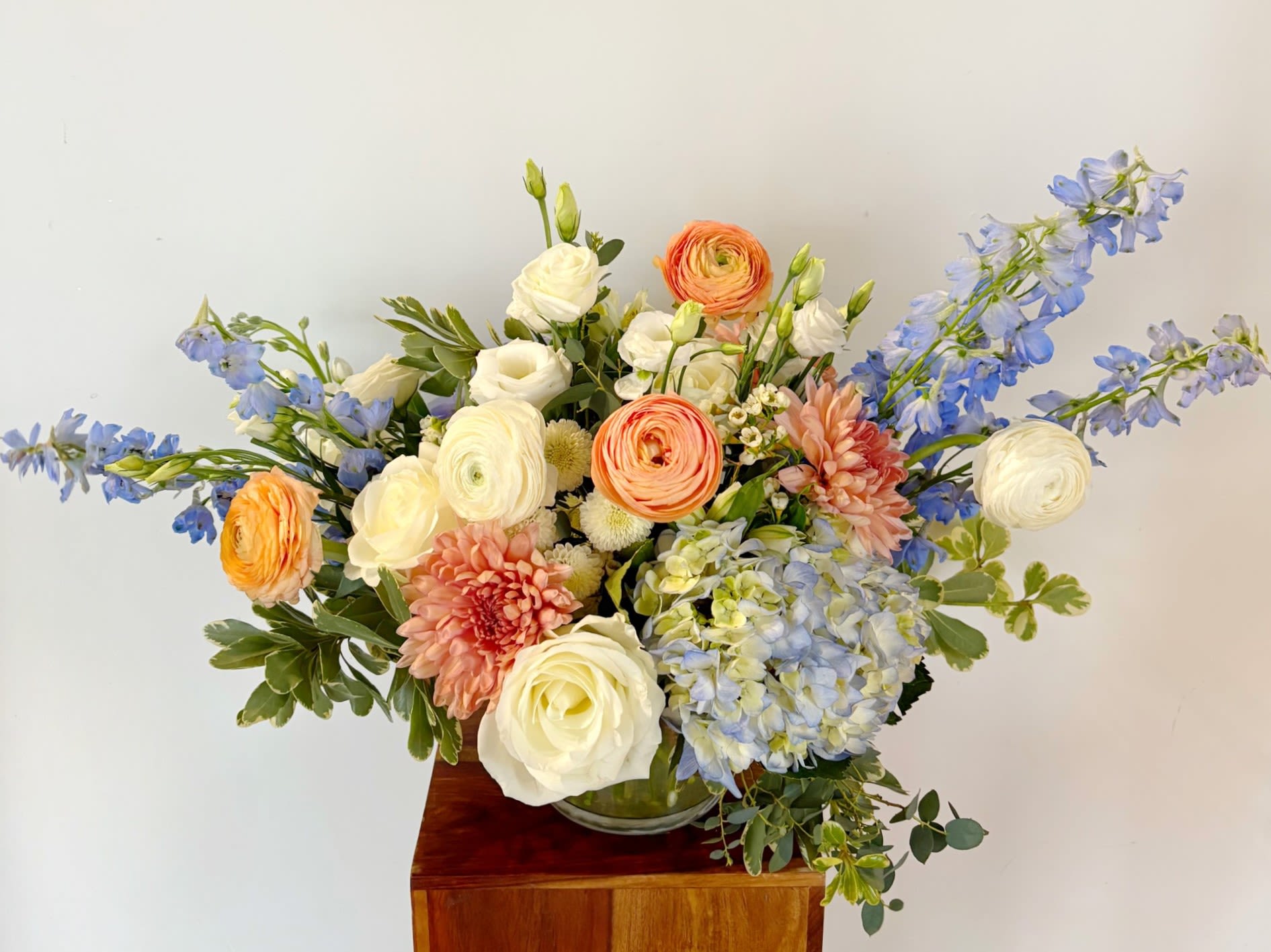 Designers Choice: Whimsy Pop of Color Mix - A whimsical assortment of seasonal blooms, unique fillers, and dried goods. A more unique, artsy arrangement than your typical delivery. Drop a note for a bit of direction or let our designers flex their talents. A mix of designer’s choice seasonal color of premium blooms.