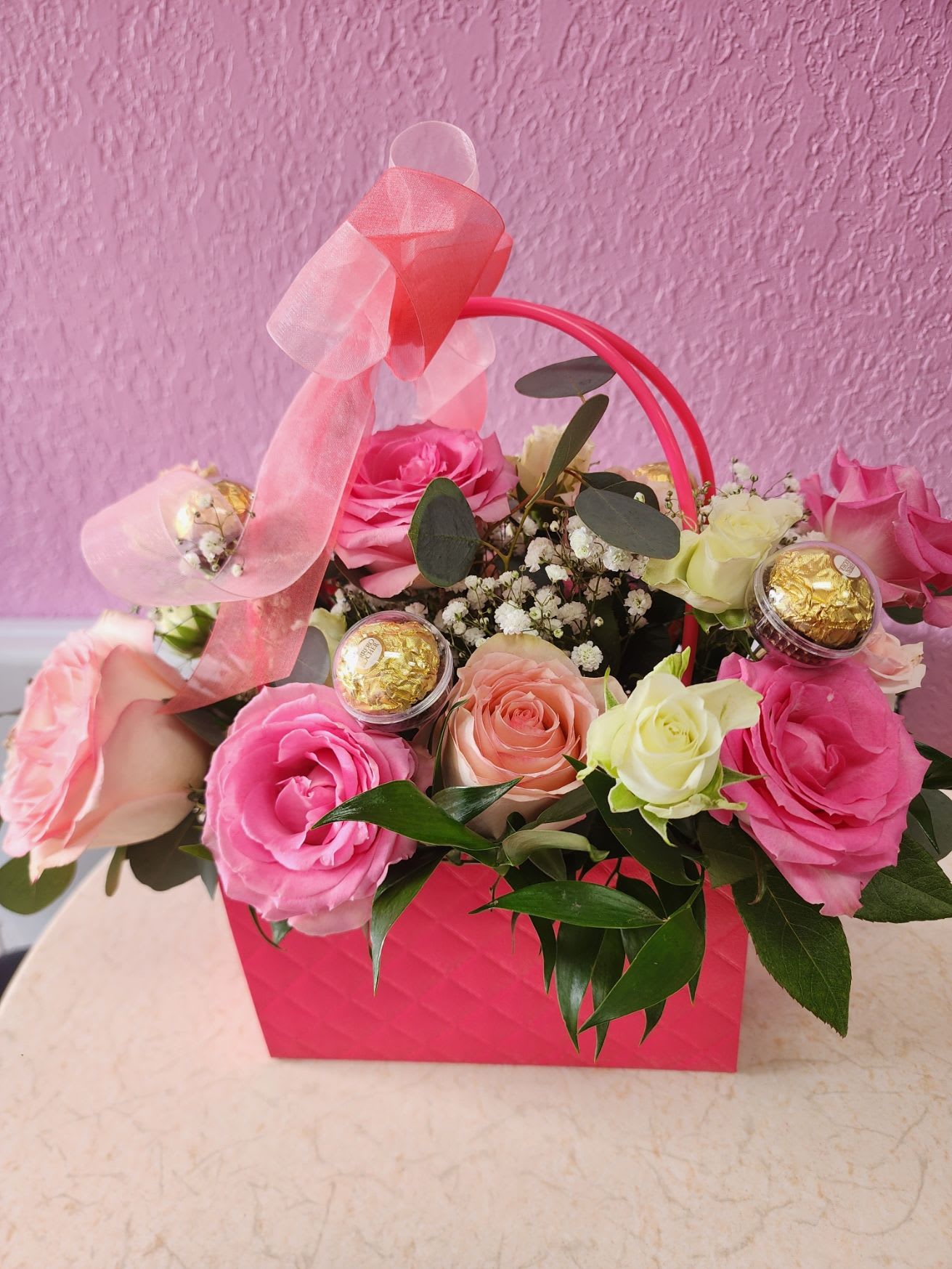Handbag Blooms with chocolate - Beautiful box with 10 Roses And 6 Ferrero Rosher and more