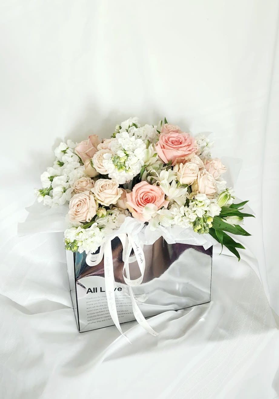 Pink Cloud - Beatiful Arrangement in Soft pink and white colors  in a silver bag.  