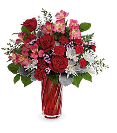 Swirling Splendor Bouquet  - This bouquet features red roses, pink alstroemeria, miniature red carnations, white cushion spray chrysanthemums, pink sinuata statice, dusty miller, parvifolia eucalyptus, leatherleaf fern and lemon leaf.  