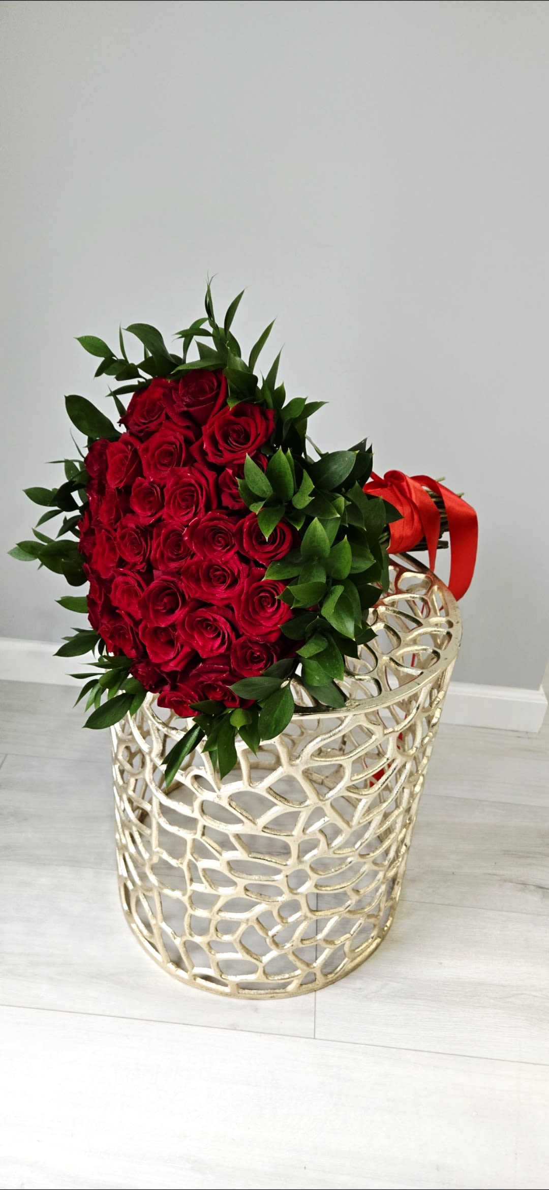 I love you  -  "A  gesture of love — ‘Crimson Elegance’ is crafted with premium 50  red roses, wrapped in rich greens and passion. The perfect statement for someone truly special." Sza