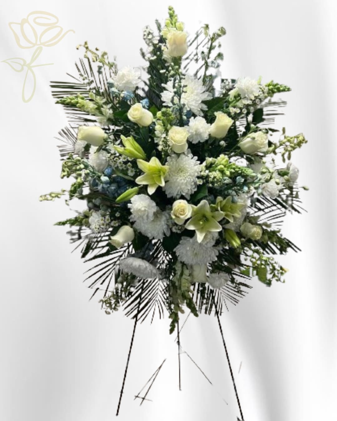 Memories forever - This arrangement represents the love and eternal memory that endures in our hearts. A tribute to our unforgettable loved one with the purity of white roses, Lilies, daisies, cremones and stock