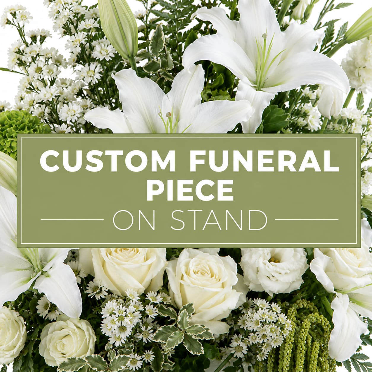 White lilies and roses arranged around a funeral sign on a stand