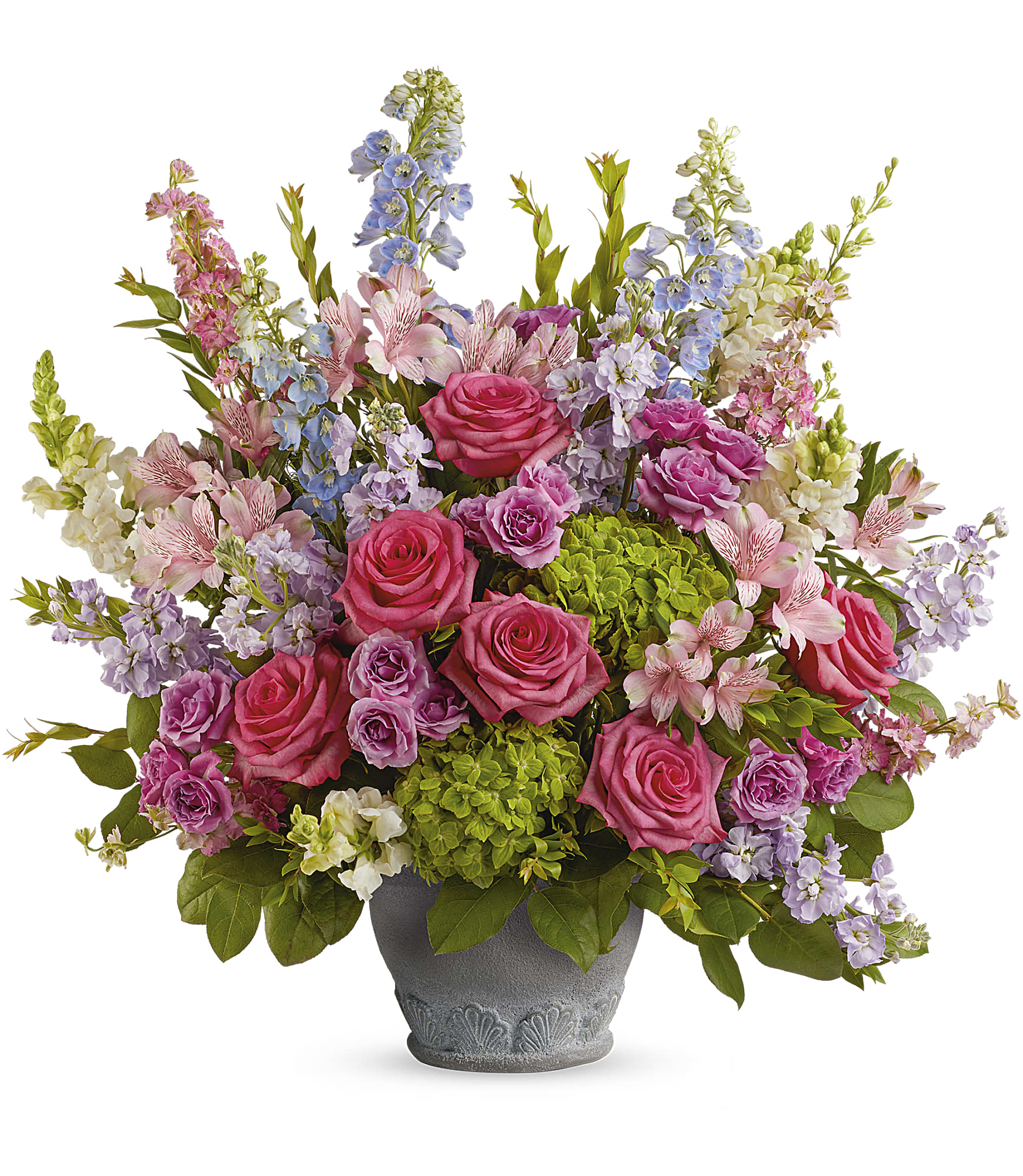 Mixed pink and lavender flowers in a gray pot