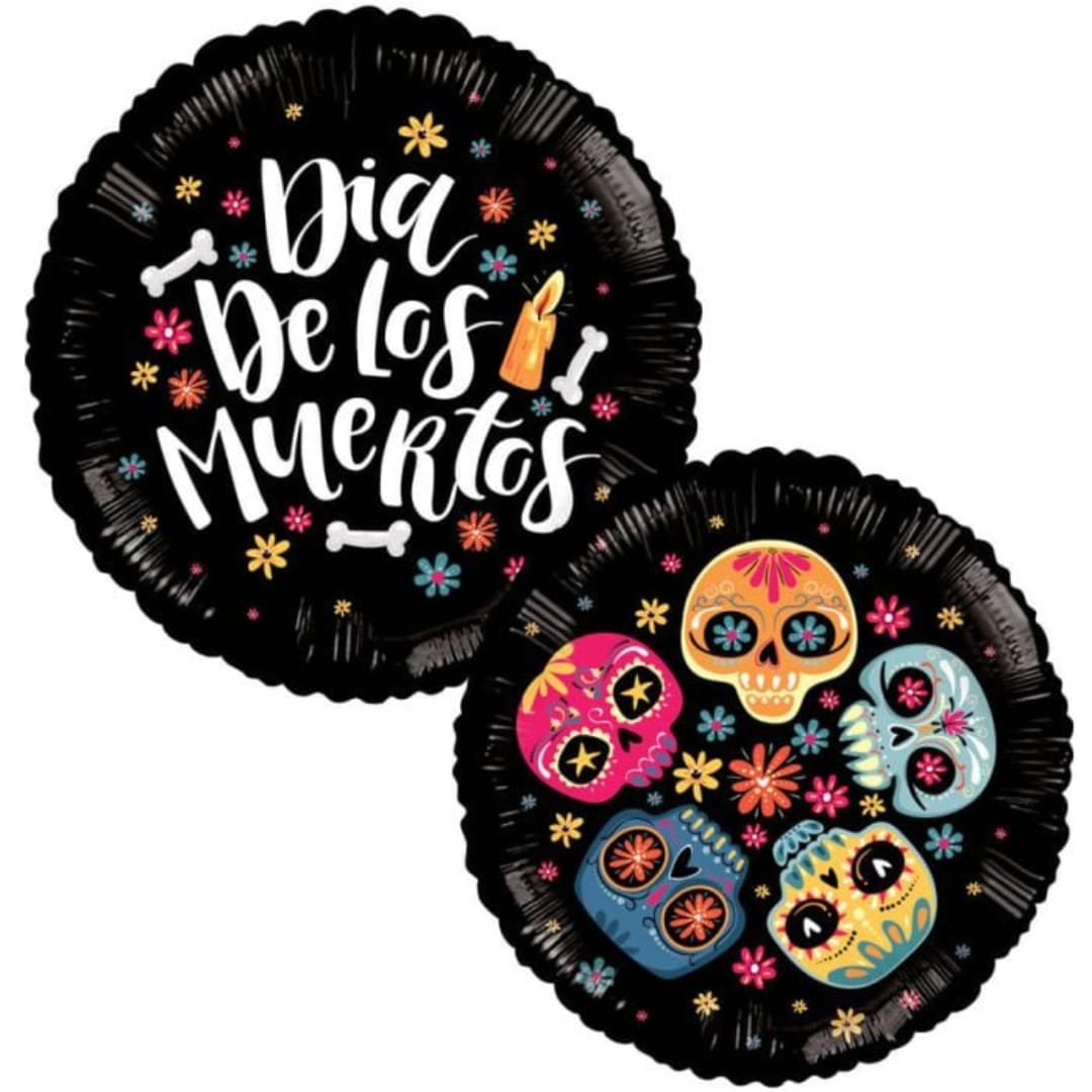 Two black Día de los Muertos balloons with colorful skull designs and text