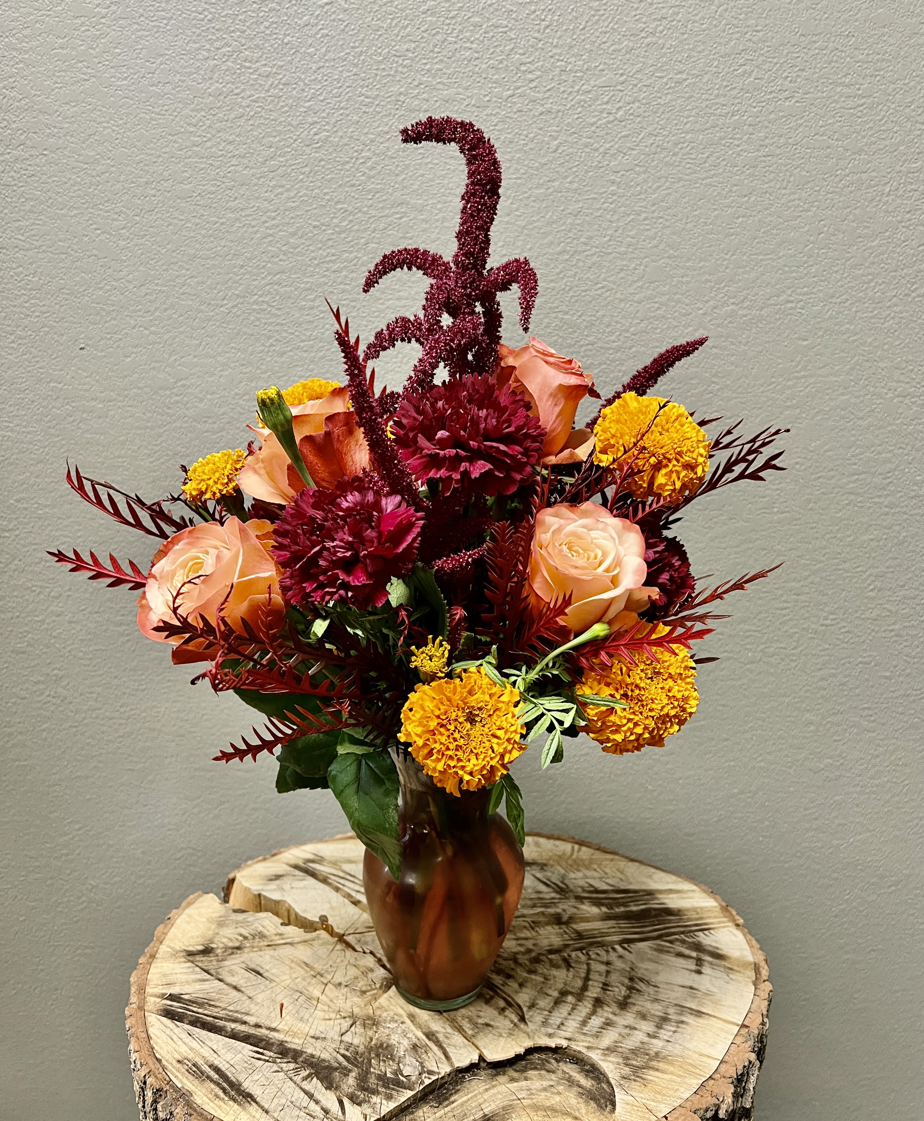 Pure Goodness - A sweet colorful arrangement designed with sweet, rich colors of flowers.  