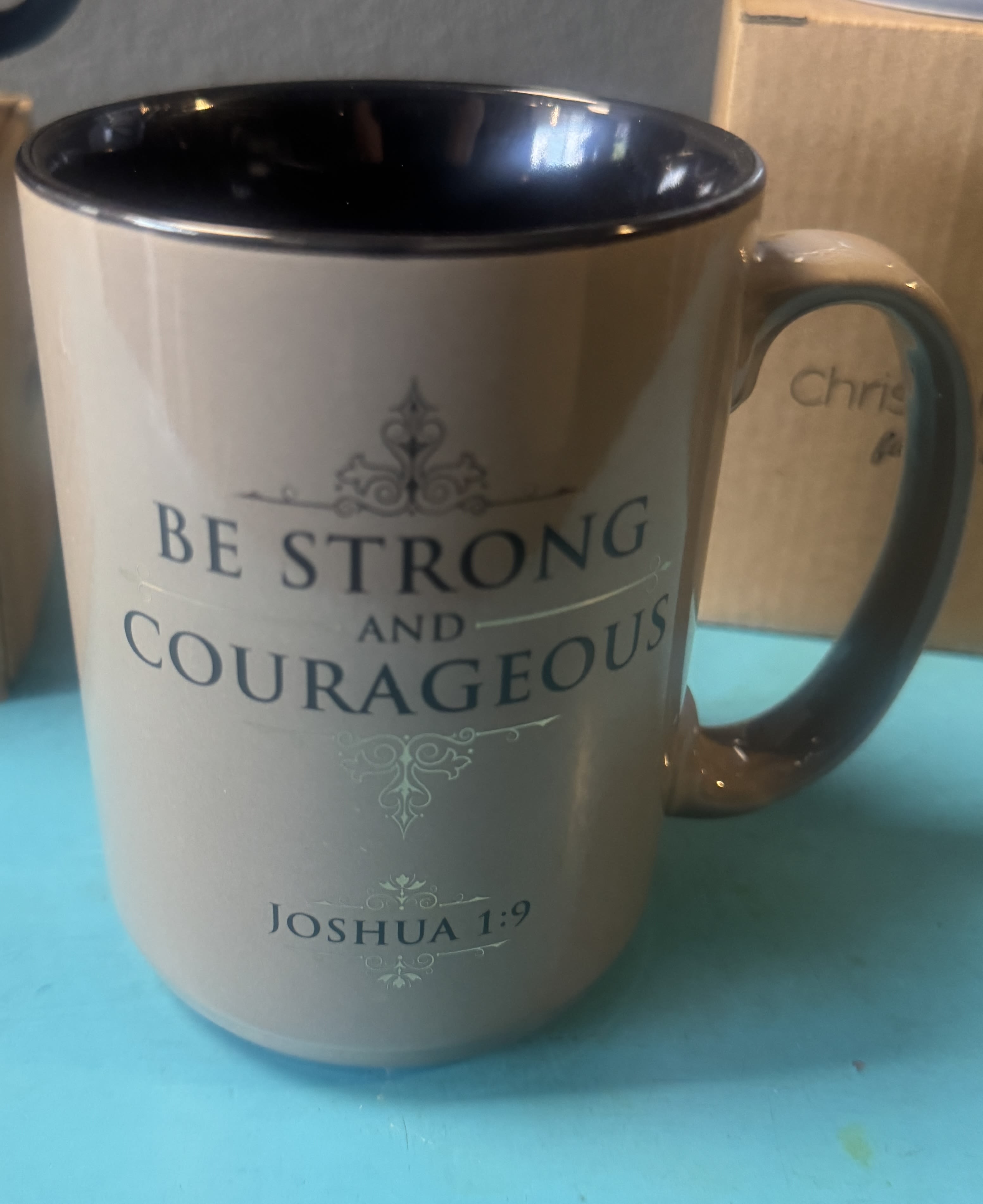 Ceramic mug with the words "Be Strong and Courageous"