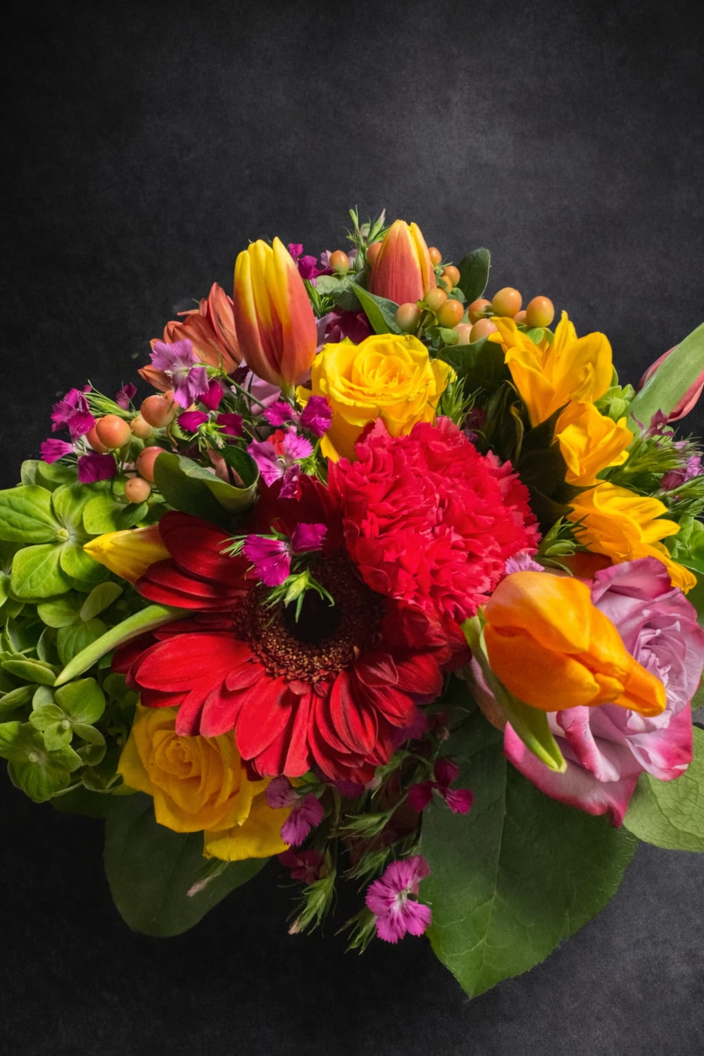 All About You - Perfect arrangement for that occasion that you just want to make someone happy. Colorful pinks with pops of white and green. 