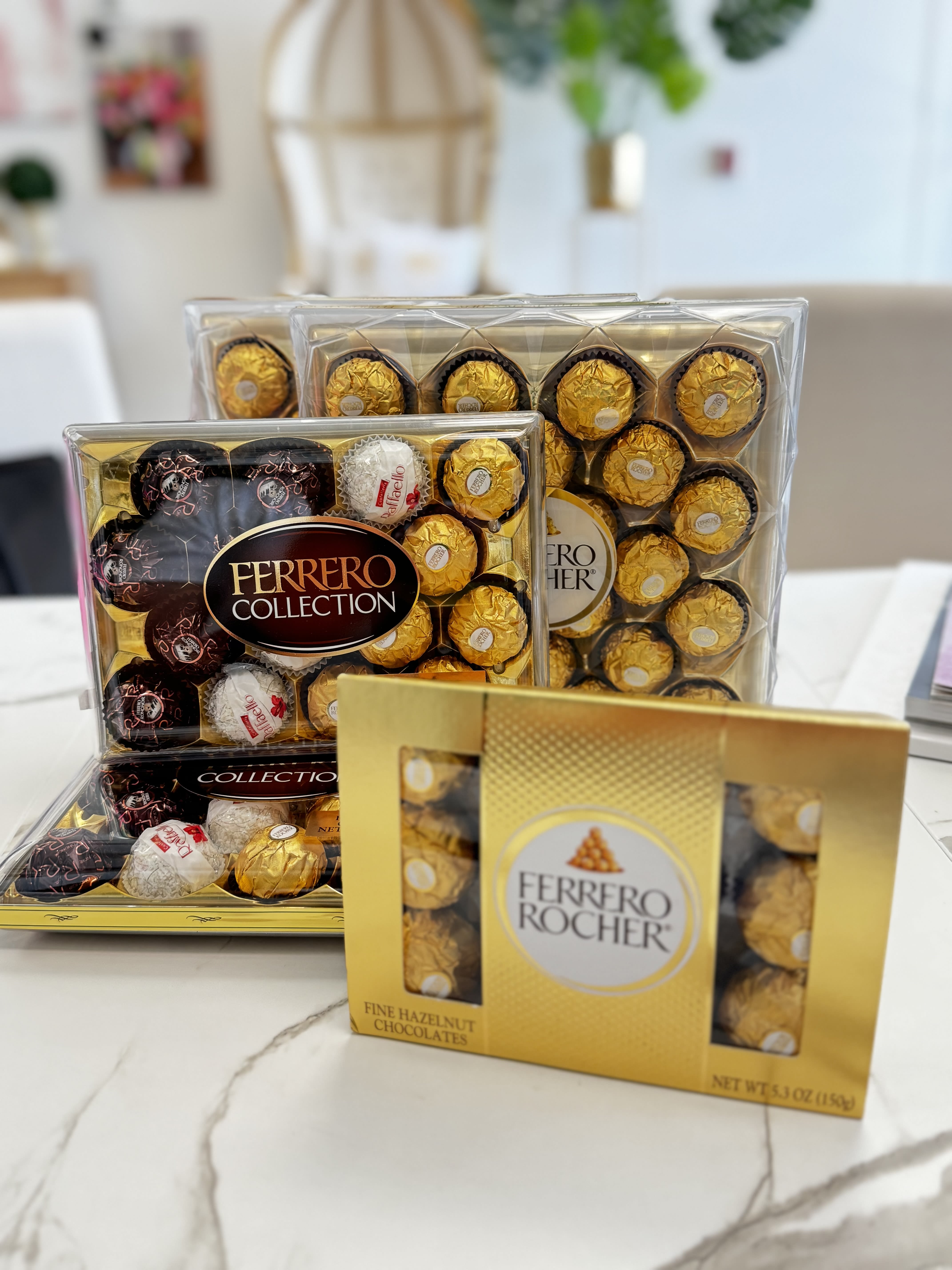 Boxes of Ferrero Rocher chocolates on a table