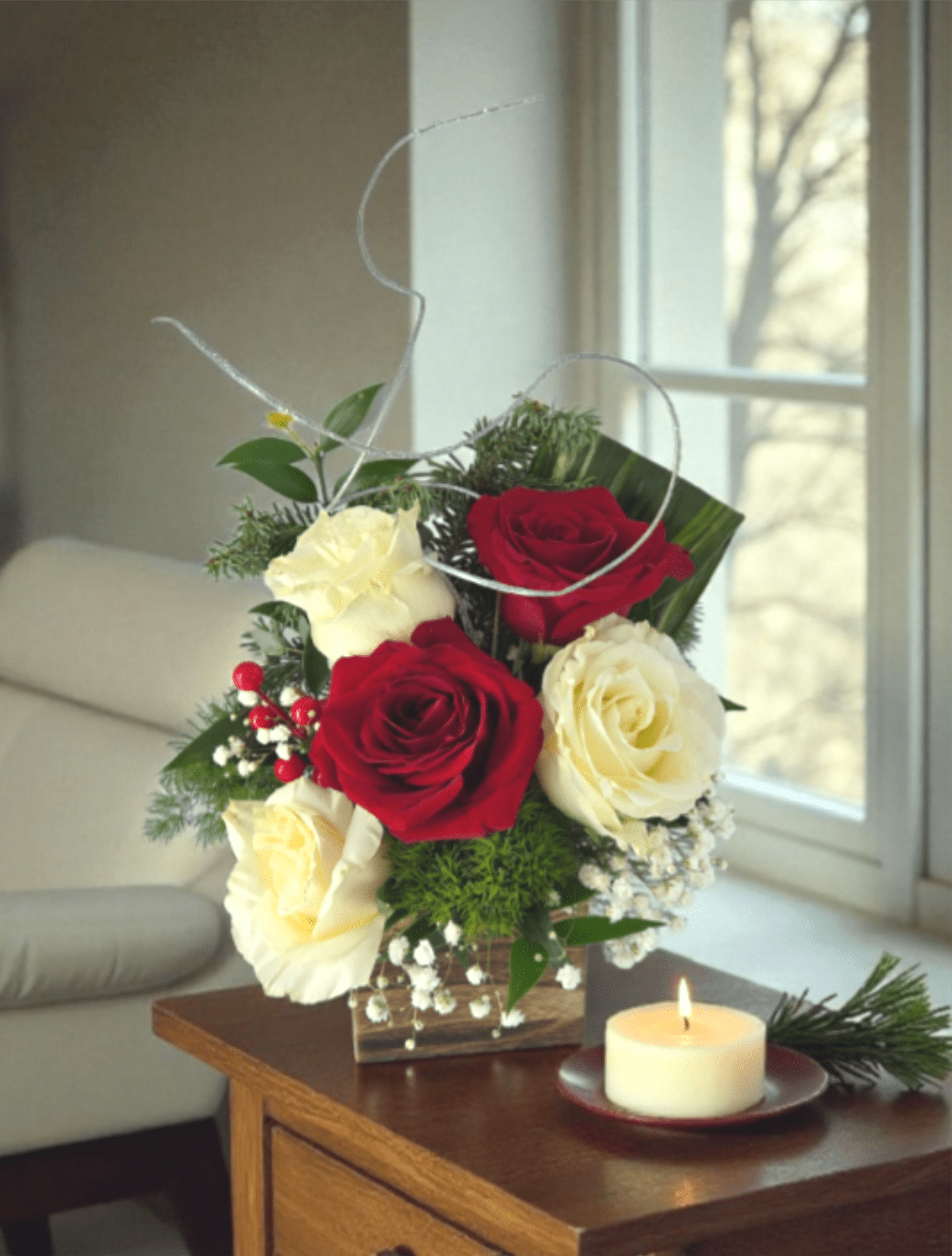 Christmas In A Box  - This Christmas gift offers beautiful roses, baby's breathe, berries, and pine. The smell of Christmas will fill the room with fresh evergreen scents. The fresh pine sprays and berries make this wood box full of joy a Christmas must have.