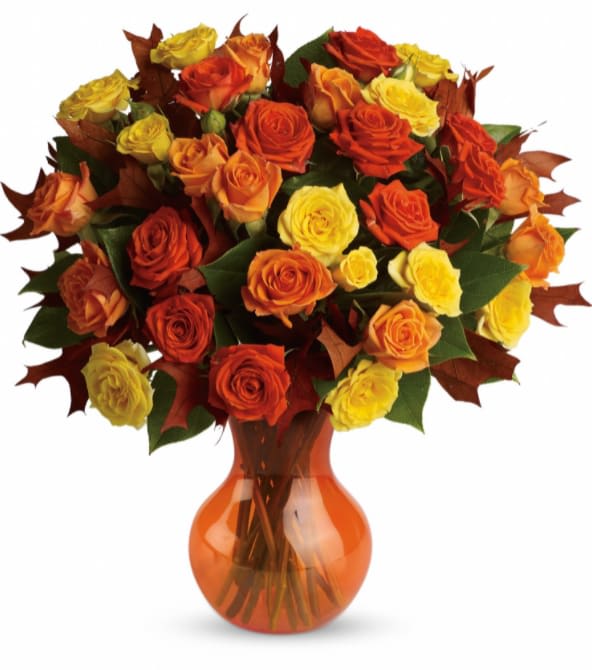Teleflora's Fabulous Fall Roses - Autumn is a many-splendored thing, and this glorious bouquet is proof. The season's most amazing flowers in a chic serendipity vase - what a spectacular splash of color and style! Bask in it.
