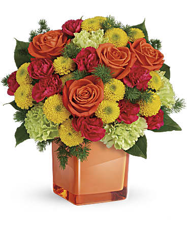 Teleflora's Citrus Smiles Bouquet - DESCRIPTION VASE SIZES Smile awhile! This spirited mix of happy citrus blooms will brighten the room, and their mood. The cheerful bouquet of roses, carnations and mums is hand-delivered in an exclusive Color Splash cube. Bold orange roses, green carnations, dark pink miniature carnations, and yellow button spray chrysanthemums are mixed with ming fern and lemon leaf. Delivered in a Teleflora Color Splash cube. Orientation: All-Around