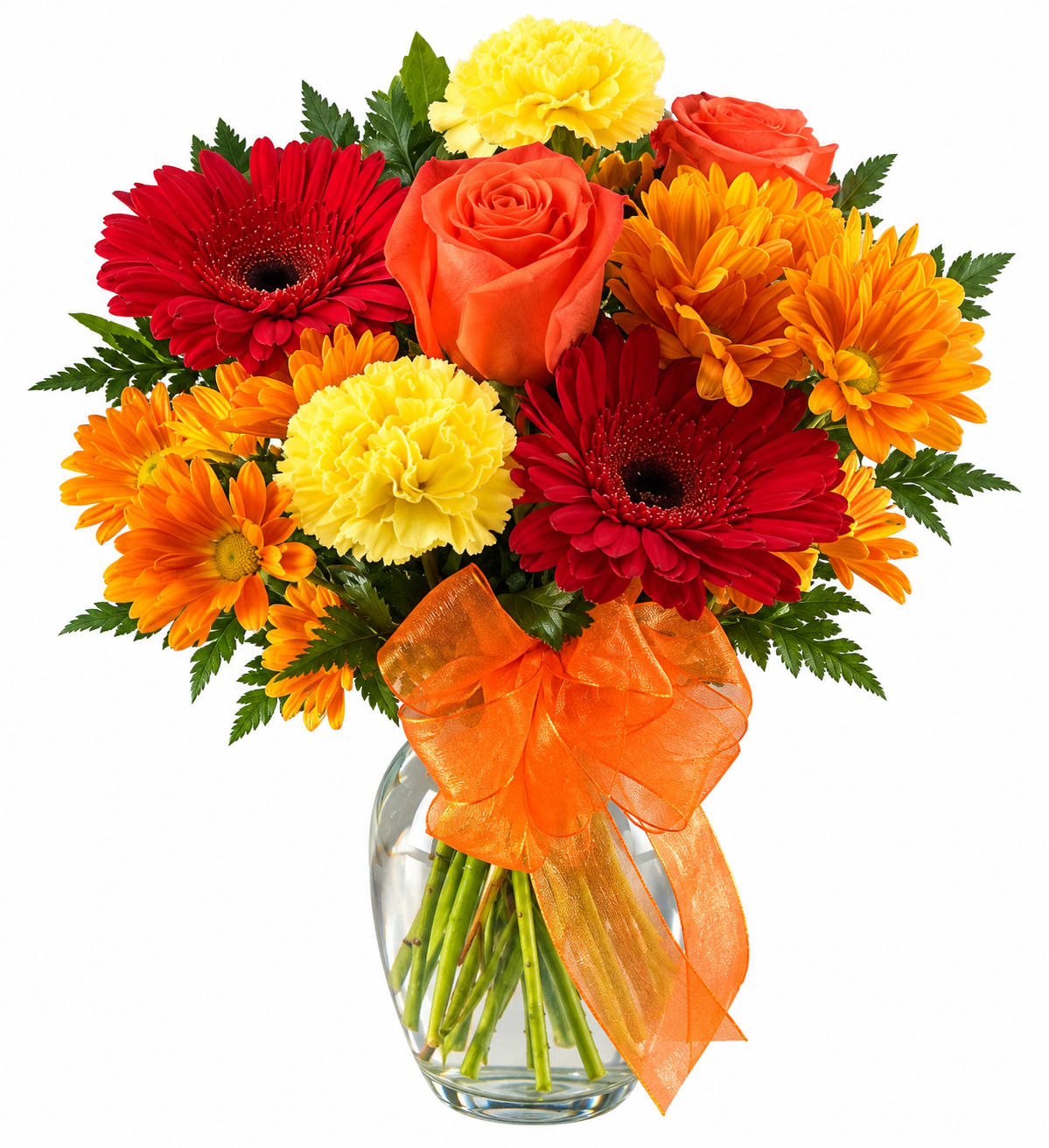 Bouquet of red, orange, and yellow flowers in a clear glass vase with an orange ribbon