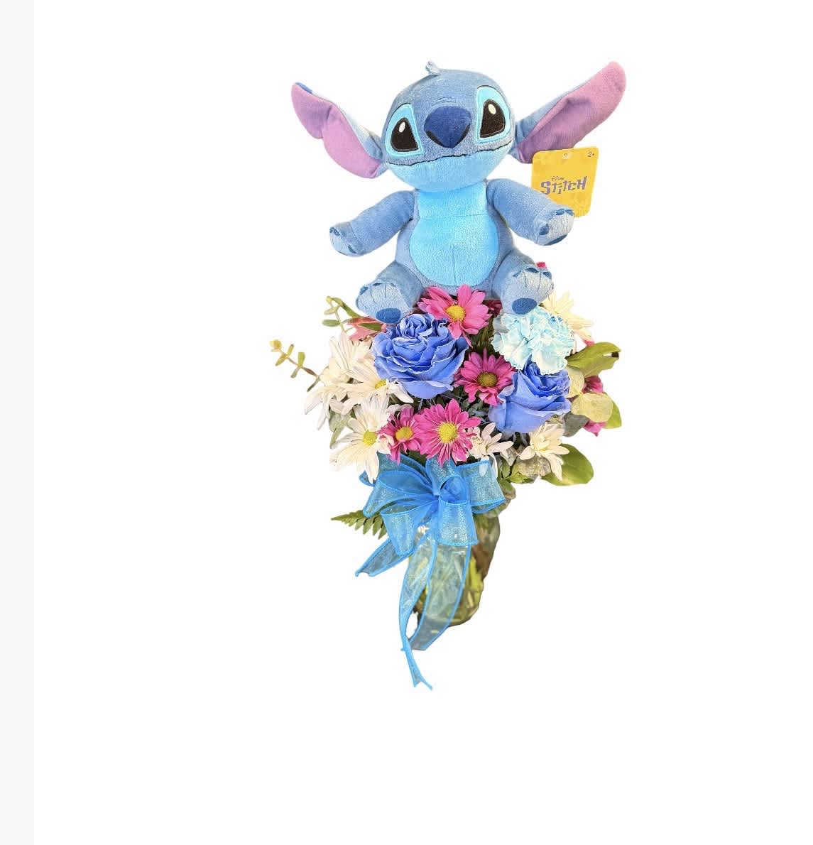 Stitch plush toy sitting on a mixed flower bouquet with a blue ribbon
