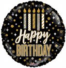 Round black birthday balloon with gold candles and "Happy Birthday" text