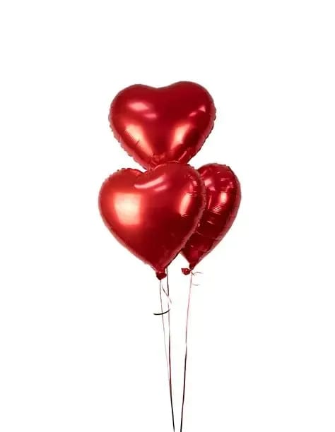 Three red heart-shaped balloons on strings
