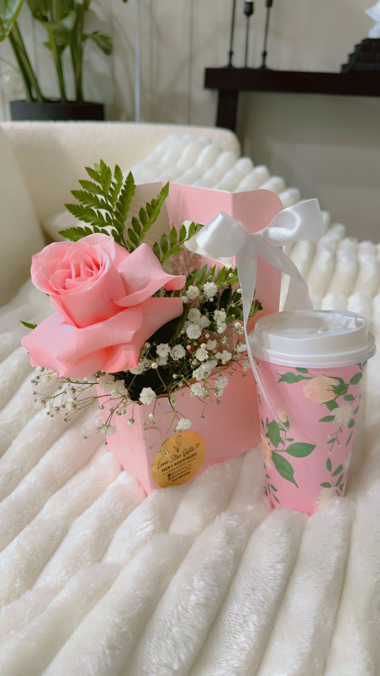 Bloom &amp; Tea –  - Bloom &amp; Tea is a delicate, boutique-style gift that makes a lasting impression—perfect for Women’s Day or simply because she deserves it.  Includes: 	•	One premium fresh rose 	•	Soft floral accents (baby’s breath + greenery) 	•	A beautiful reusable floral cup 	•	One relaxing tea sachet 	•	Finished with a satin ribbon and our signature gold seal