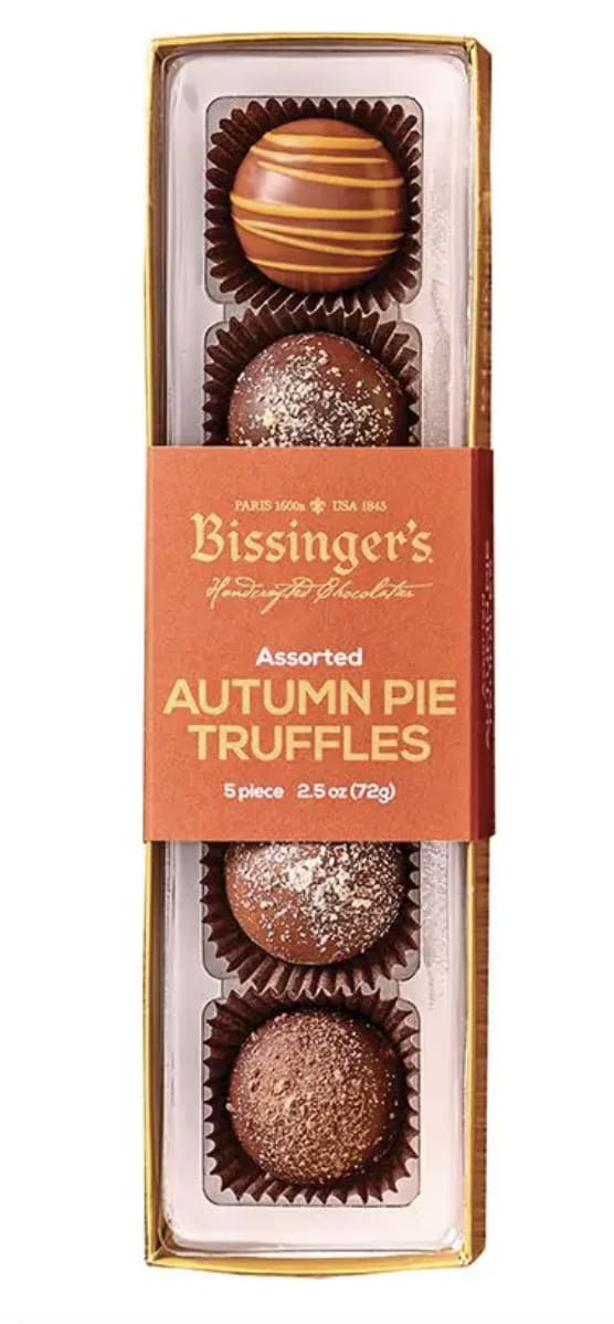 Box of assorted autumn pie truffles in clear packaging