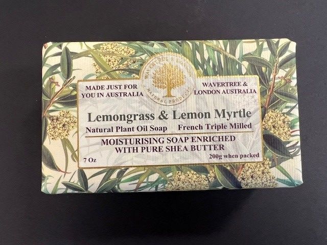 Bar of lemongrass and lemon myrtle soap in printed packaging