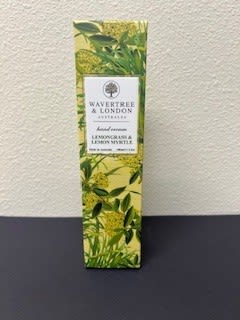 Tall rectangular box with a leafy yellow-green botanical print