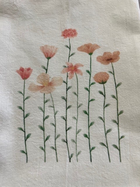 Floral print with tall pink and peach flowers on thin stems