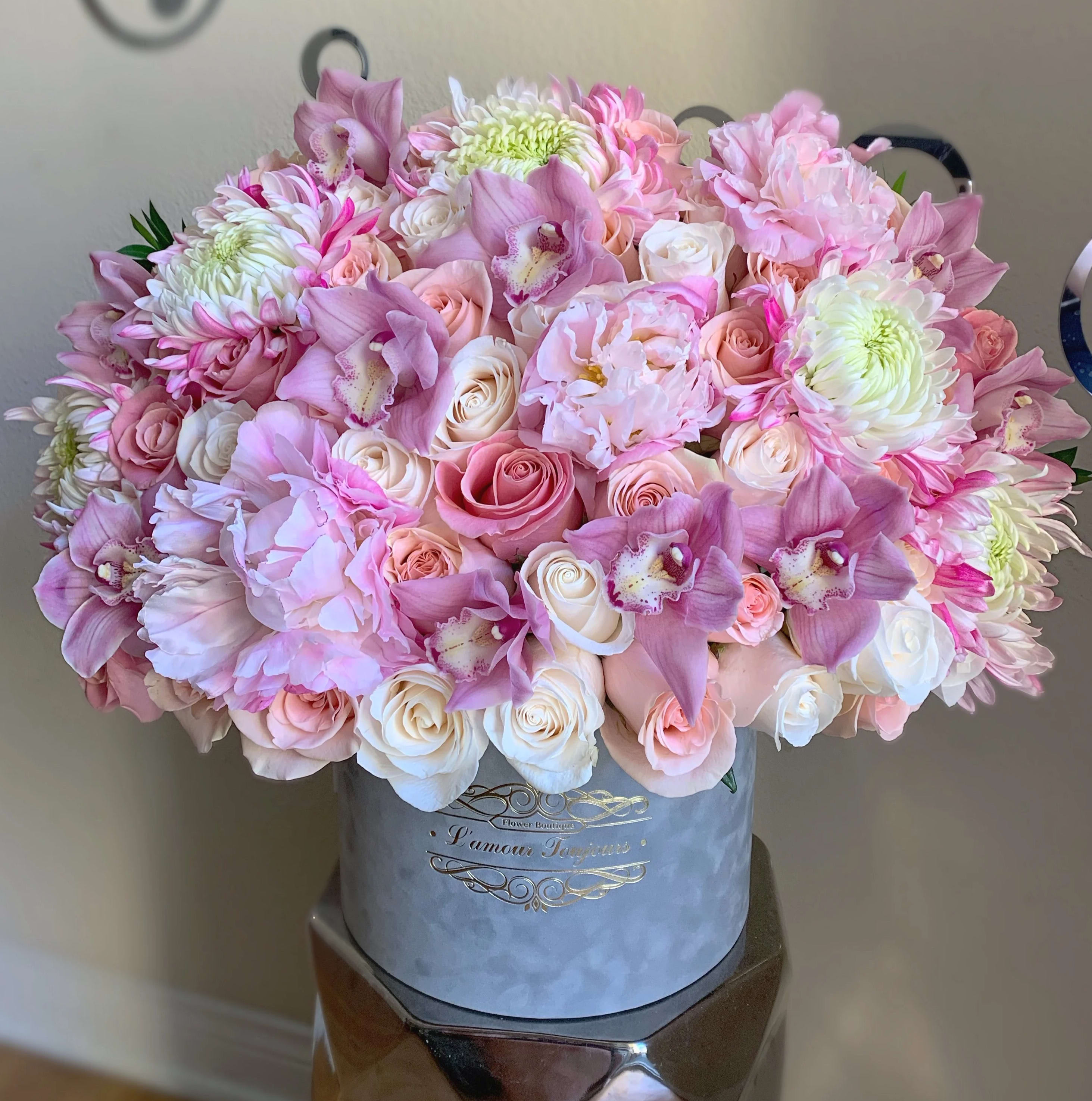 The Extraordinary Signature Box - The lush mix of roses, orchids and dahlias in a Gray Velvet Signature Box