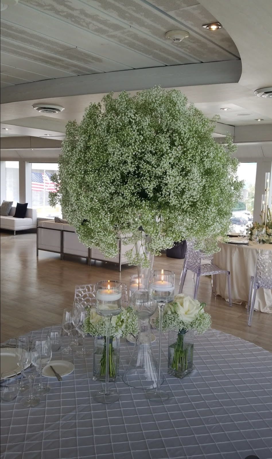 Center Piece with Baby Breath  - Elevate your wedding tables with our elegant centerpieces.